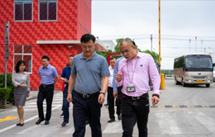 li ming, the mayor of wujiang district, and his party came to visit our company